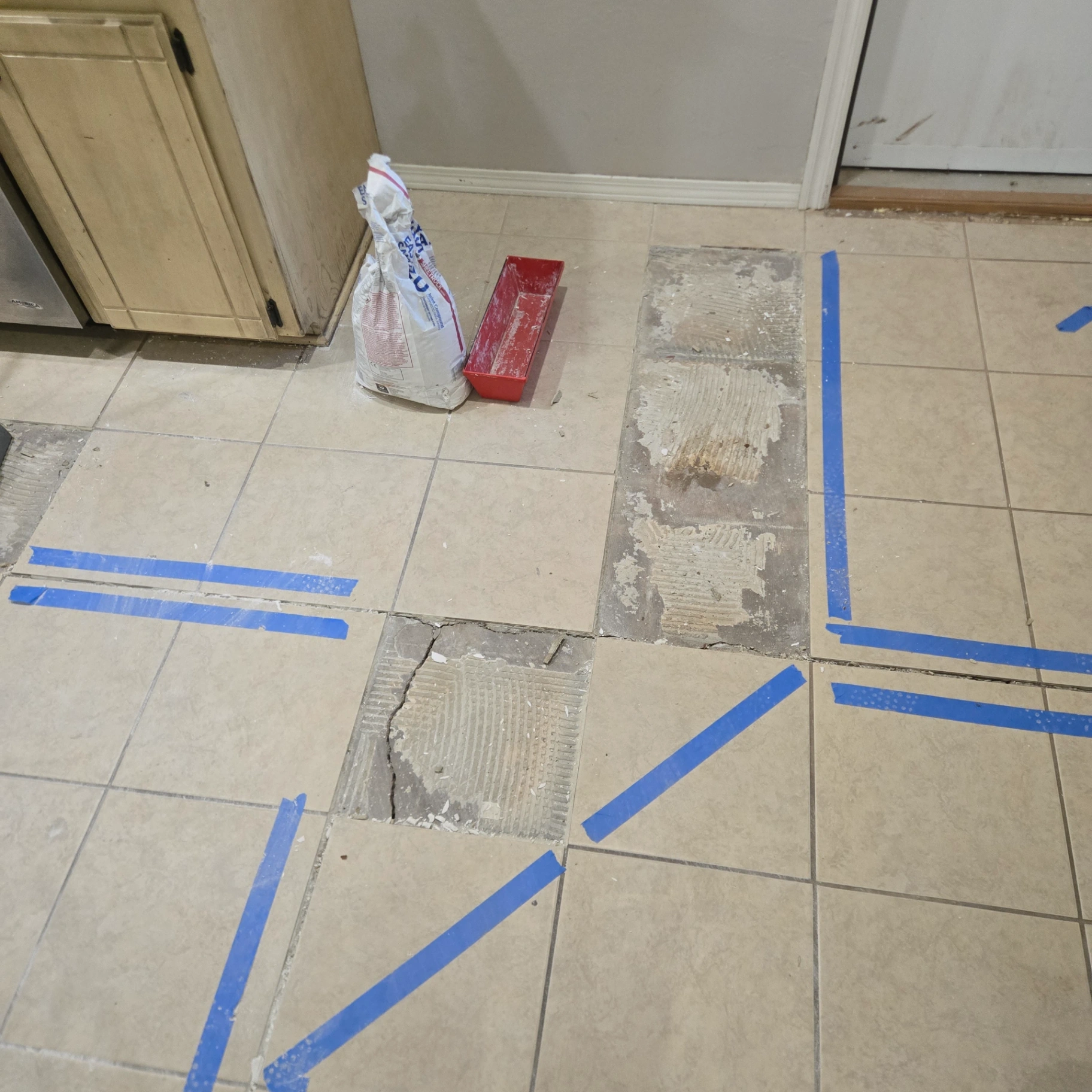 Kitchen floor tile replacement preparation in Lincoln County