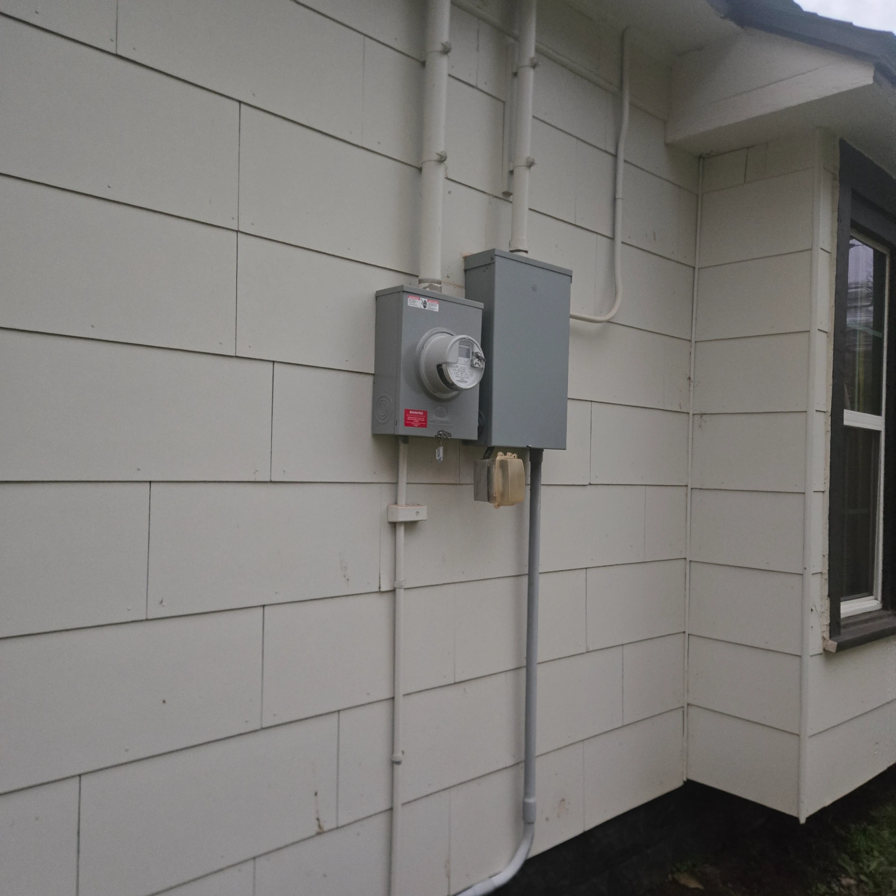 Exterior electrical and siding work in Morrison