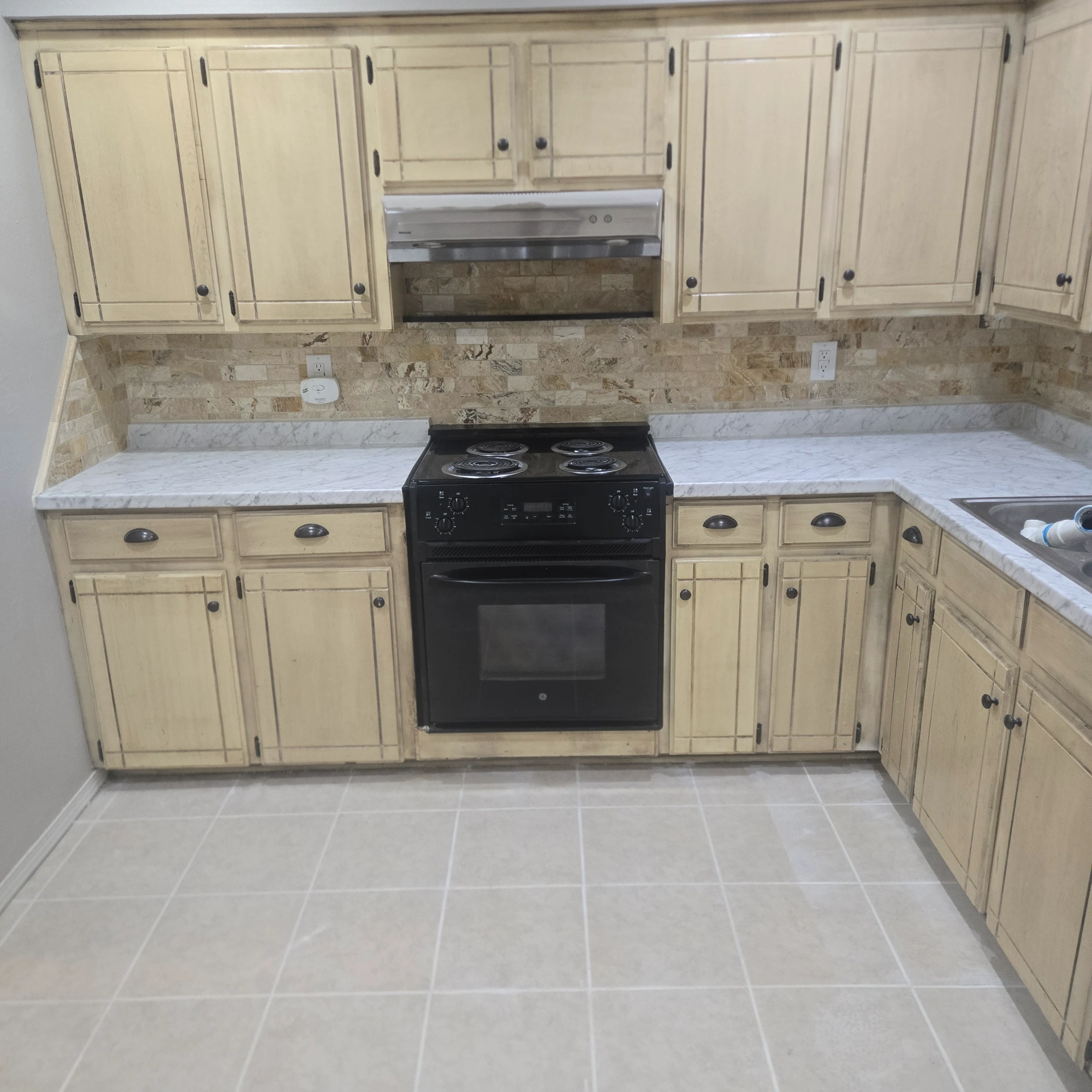 Kitchen remodel with new cabinets, backsplash and countertops completed for a Perkins Oklahoma homeowner