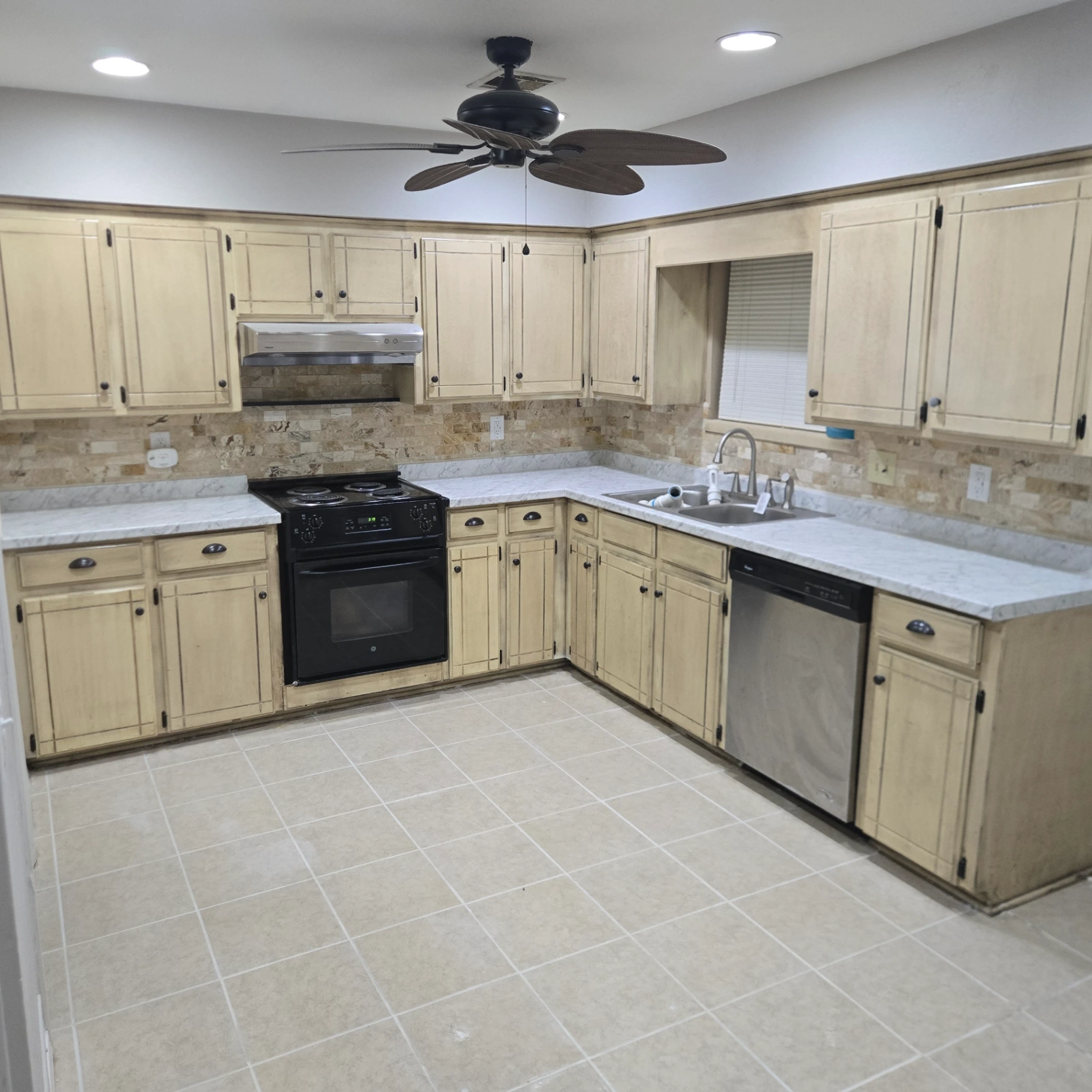 Complete kitchen remodel with ceiling fan and recessed lighting by Stillwater Handymen