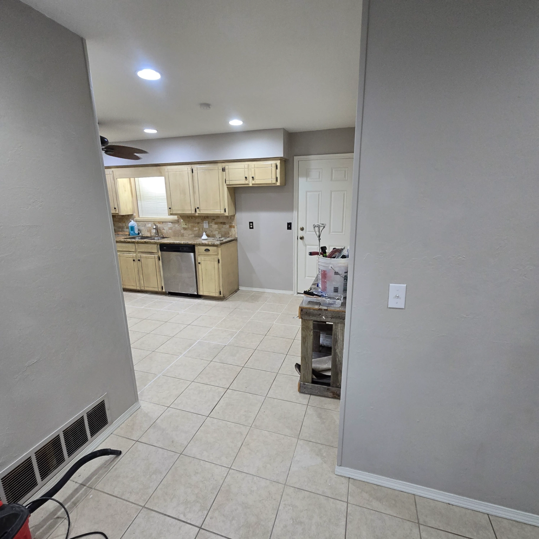 Freshly painted grey walls and white trim in a Stillwater home kitchen