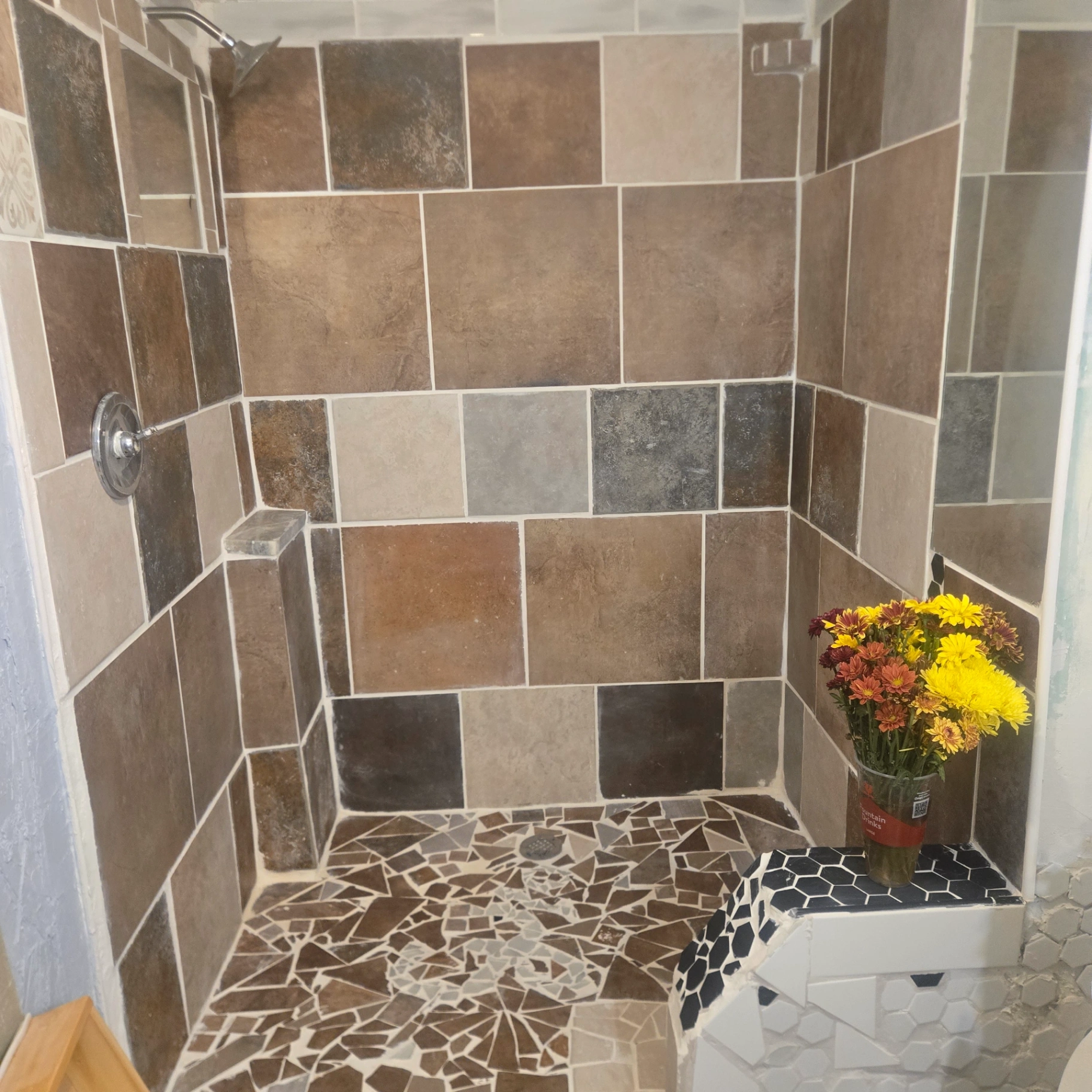 Custom tiled shower with mosaic accents installed by handyman serving Ripley Oklahoma